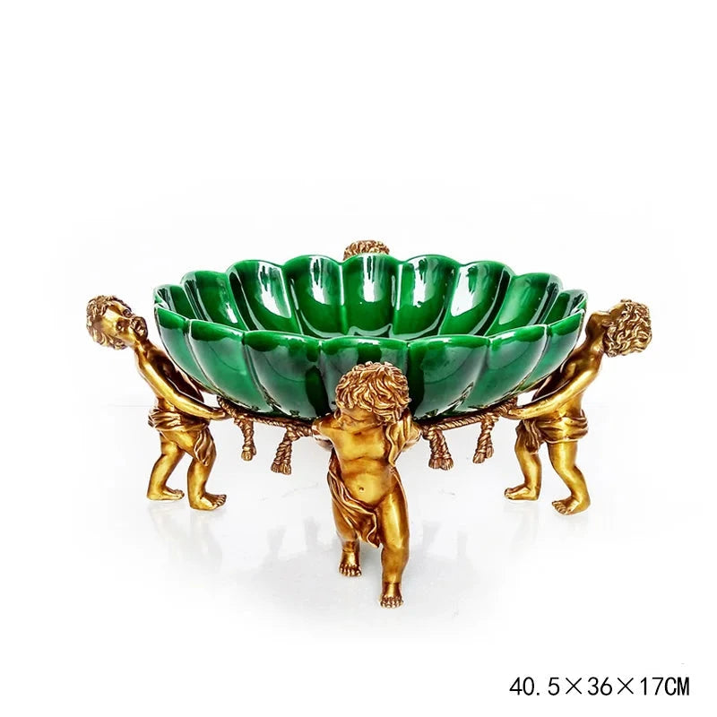 Decorative bowl with green center and gold cherub figures - Luxury home decor 